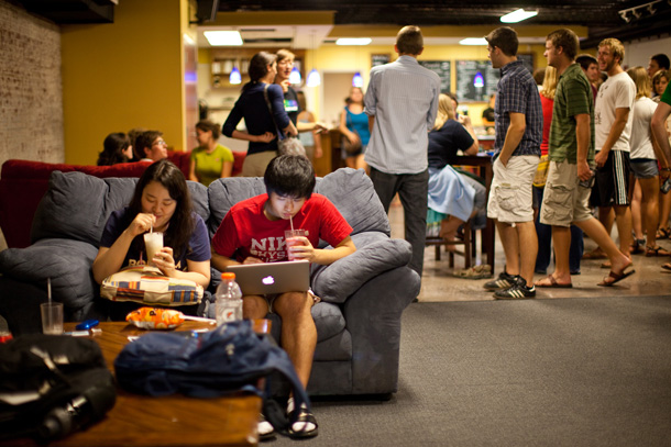 EMU students relax at the renovated and expanded Common Grounds coffeehouse, a student-run enterprise where campus concerts, forums and discussions, and other events occur throughout the semester.