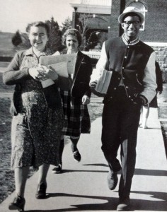 Grandison Hill walking through campus in 1963 with Northlawn residence hall in the background.