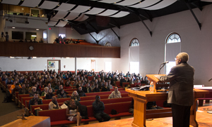 Vincent Harding speaking at university chapel at EMU. 
