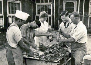 Mary Emma and others dressing chickens at the Grottoes, Va., Civilian Public Service camp.