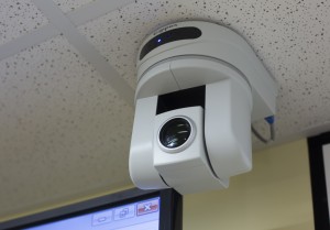 (20150819) - (Harrisonburg)  Cameras placed at each end of the classroom can be controlled and utilized in a variety of methods to help enhance the classroom experience for those connecting remotely to EMU's classrooms. (Daniel Lin/Daily News-Record)