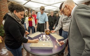 (Harrisonburg) Eastern Mennonite University students, administration, and community members light candles during a prayer vigil for the victims of a shooting in Hesston, Kansas. (Daniel Lin/Daily News-Record)