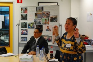 Filipino peacebuilder Deng Giguiento (right) and General Raymundo Ferrer talk about their relationship during a workshop.