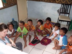 Children enjoy story time with Grace Praseyto in Indonesia. (Courtesy photo)