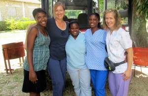 Professor Ann Schaeffer (second from left) with Haitian midwives trained by Nadene Brunk's nonprofit organization.