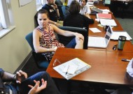 Jennifer Larson Sawin (center), MA '04, with restorative justice professor Carl Stauffer (left) at a workshop at EMU. (Photo by Howard Zehr.)