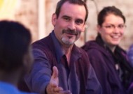 Carl Stauffer (center), practicing the art
