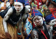 Dancers from the village of Kongonanie in Sierra Leone wait to participate in a welcome ceremony prior to the bonfire that will take place that night, as part of Fambul Tok’s grass-roots reconciliation program.