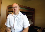 Thad Hicks in a Salvation Army dorm room