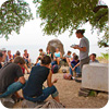 EMU cross-cultural students break for a study session overlooking the Sea of Galilee