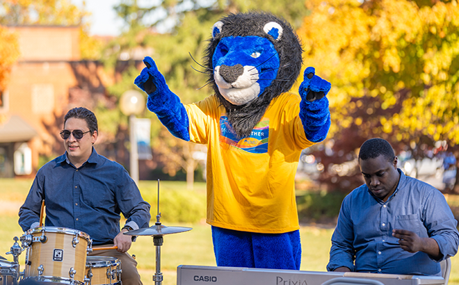 Development officer with Herm- EMU's mascot