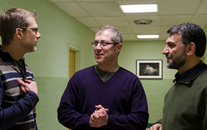 Niles Goldstein (center), an ordained Reform Jewish rabbi, is one of two teachers bringing a Jewish perspective to EMU this semester. Goldstein is pictured here with two other colleagues: Reuben Shank (left), a Mennonite who is studying for a doctorate in religion at the University of Virginia, and Amir Akrami, a Muslim scholar from Iran. 