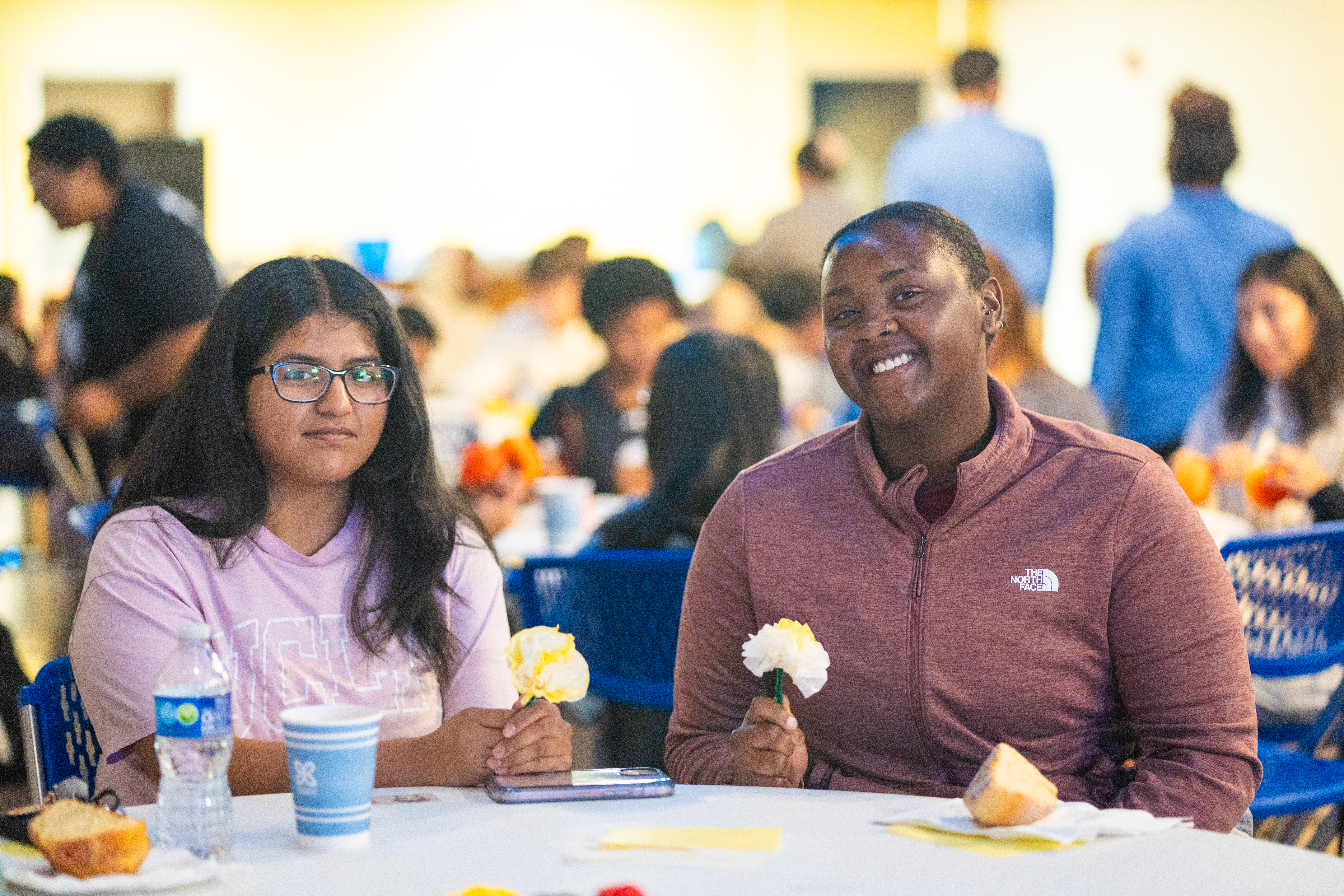 Students eating at an event