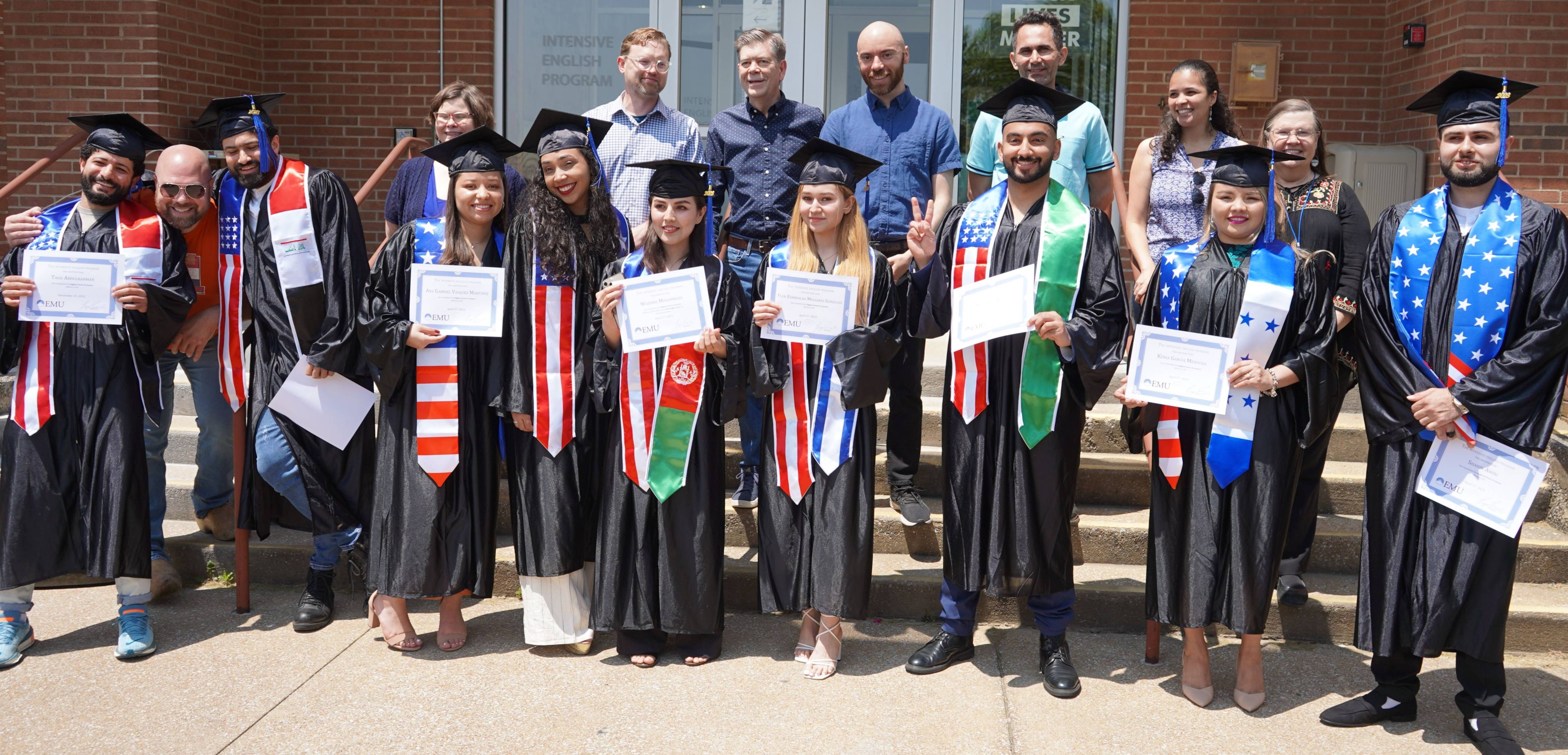 IEP graduates standing together