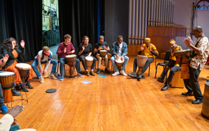 students in a drum circle
