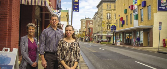 Alumni at the Fairfield Center (from left): Sue Praill, MA '10 (conflict transformation), directs its restorative justice programs; Tim Ruebke '92, MA '99 (conflict transformation) is its executive director; and Shannon Sneary '93 oversees its training services. (Photo by Jon Styer)