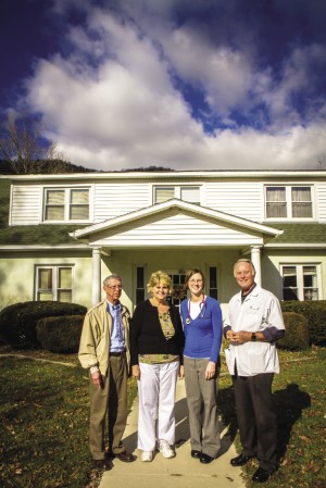 Dr. Linford Gehman ’59 (left) has seen patients at the Green Valley Clinic for 43 years. Also with the practice (from left) are nurse Elaine See-Dellinger ’75, physician assistant Hanna Reinford ’05, and Dr. Sam Showalter ’65. (Photo by Jon Styer)