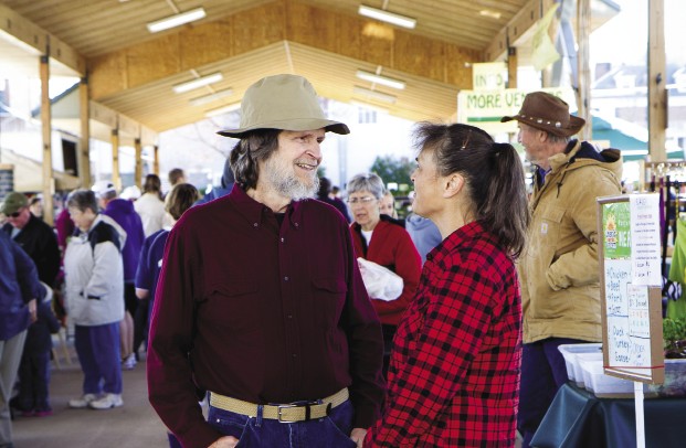 Samuel Johnson, class of 1975, and his wife Margaret Wenger Johnson '69 were the first farmers to sell their produce in downtown Harrisonburg for an entire growing season. They went on to lobby for a farmers market and see their dream come to fruition. (Photo by Jon Styer)