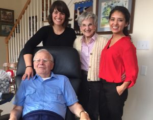 Diana Tovar (standing, left) with James and Marian Payne, founding donors of the Center for Justice and Peacebuilding, and graduate student Isabel Castillo. Tovar and Castillo are recipients of scholarships funded by the couple. The new peacebuilding network coordinator position is also similarly funded . (Courtesy photo)