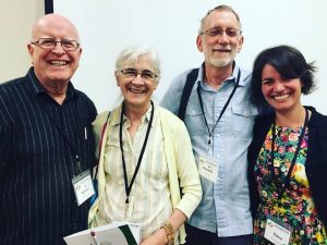Diana Tovar with mentors and colleagues at the Center for Justice and Peacebuilding: (from left) Professor Vernon Jantzi, circles process trainer Kay Pranis, and Professor Emeritus Howard Zehr. (Courtesy photo)