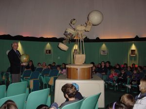 Professor Joe Mast hosts a program at the Brackbill Planetarium.