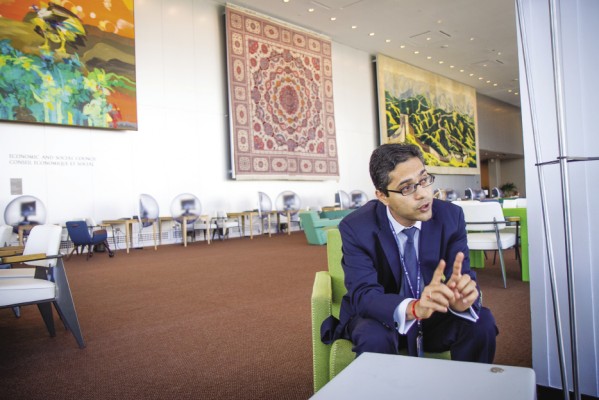 ￼Kumar Anuraj Jha, MA ’07, worked with a UN team addressing the needs of former child soldiers in Nepal before moving to UN headquarters, where he focuses on issues related to children and armed conflict in Africa. Here he is chatting in the delegate lounge on the second floor of the main UN building.