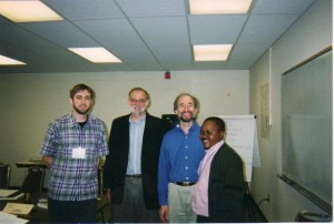 Kabale with Professor Ron Kyrabill and two other Summer Peacebuilding Institute participants in 2003