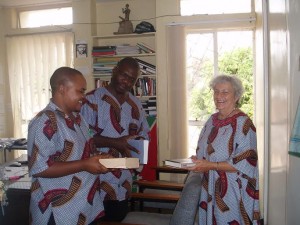 Kabale Ignatius Mukunto (left) with DeEtte Beghtol, former MCC service worker and Babu Ayindo, MA `98, as faculty at Zambia's Mindolo Ecumenical Foundation in Kitwe. 