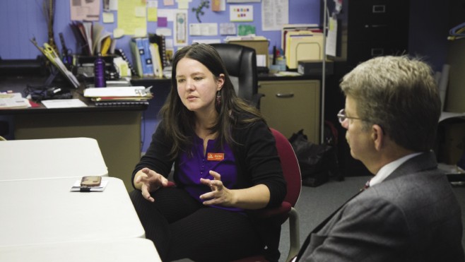 Alicia Horst ’01, MDiv ’06, executive director of Newbridges Immigrant Resource Center chats with Les Helmuth ’78, chairman of its board of directors.