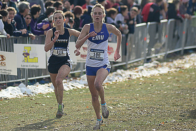 Kat Lehman (No. 100) crossed near the lead of a tight group of runners during the 2014 NCAA cross country championships. (Photo by d3photography)