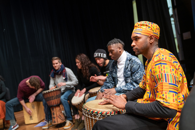 Students in a drum circle
