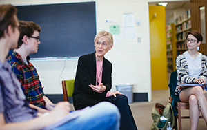 Nancy Heisey talks with students