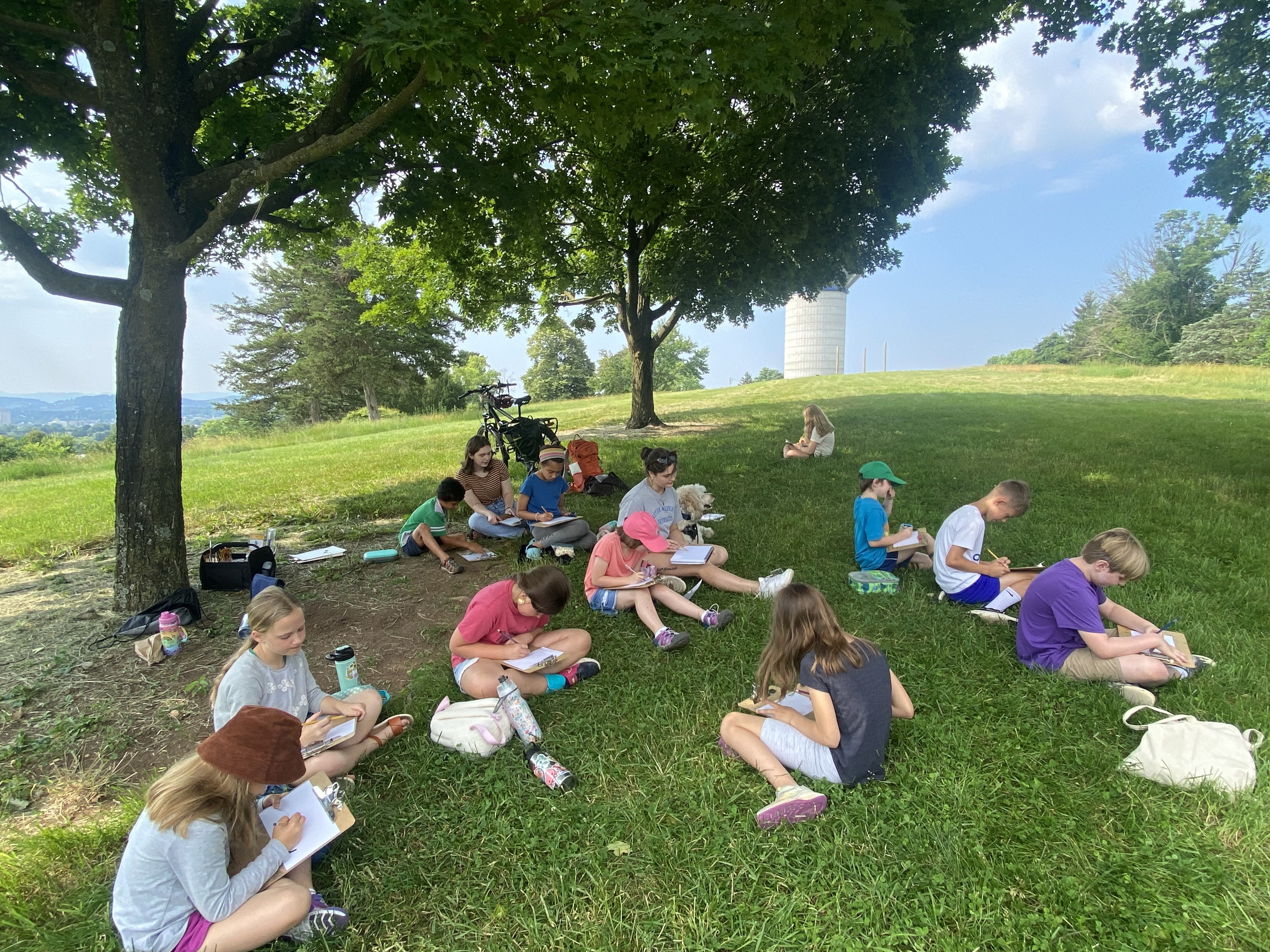 children drawing outside