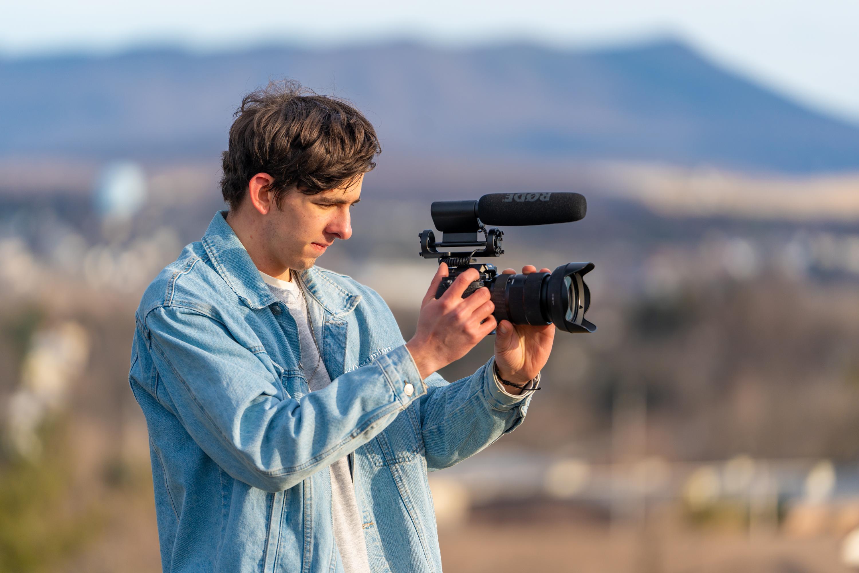 Equipment, student with camera